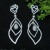 Petal Shaped Entwined Sterling Silver Dangler Earrings